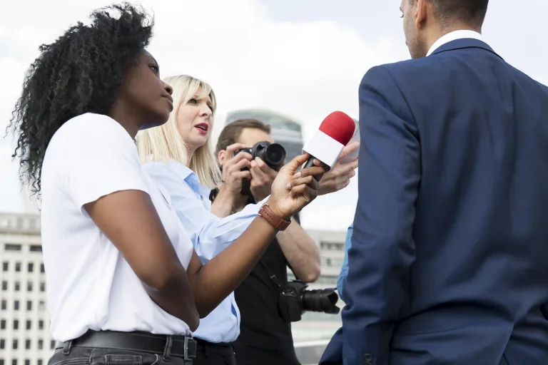 close-up-interviewee-with-microphone-taking-statements